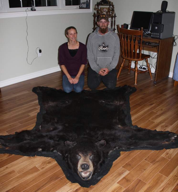 Clavering native Kim Barfoot and husband Chris show off the sheer size of the massive black bear she harvested in 2002.  The bear surpassed the 500lb mark and had a skull measurement of over 19 inches; a trophy bear anywhere in Canada.