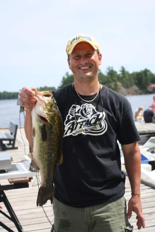 Bass-Bass Club President Rod Freiburger of Tara with a largemouth bass from a Grey-Bruce Bass Club event last summer.  Local anglers are anticipating the upcoming open season for the region's spectacular bass fishing.