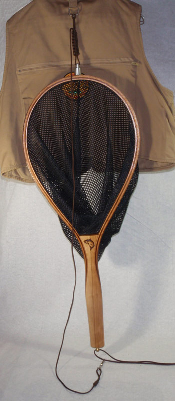 This is net 012 with magnetic net release attached and on a fishing vest