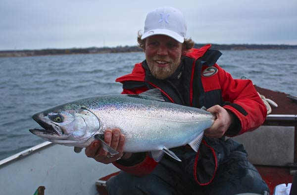 Local angler and British Columbia salmon guide Reid Cameron enjoys the return of the Chinooks to Owen Sound Bay last weekend.  Like hundreds of other anglers, Cameron and his angling buddies enjoyed excellent catches of spring salmon which appeared in the bay to feed on smelt.
